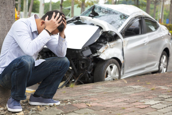 Painful man after a car crash